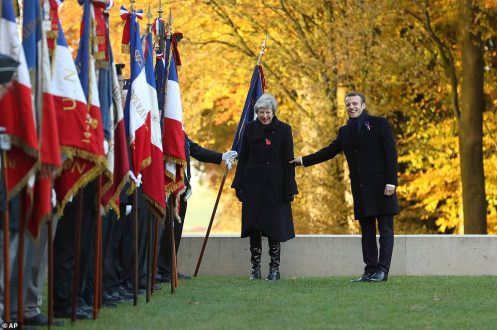 5986538-6374507-British_Prime_Minister_Theresa_May_and_France_s_Macron_are_seen_-a-19_1541853181677